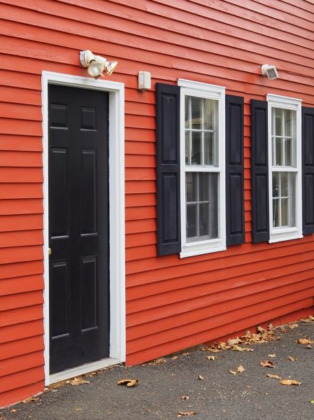Red Vinyl Siding Installation in Billings